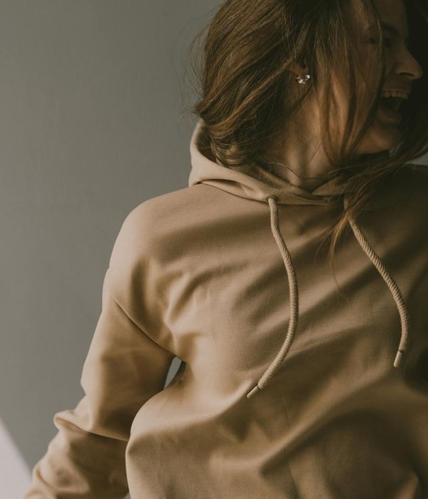 Woman feeling energetic and happy after a light cardio session.
